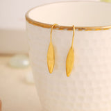 Sleek golden dangle earrings