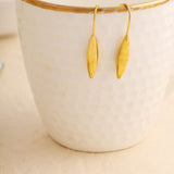 Sleek golden dangle earrings