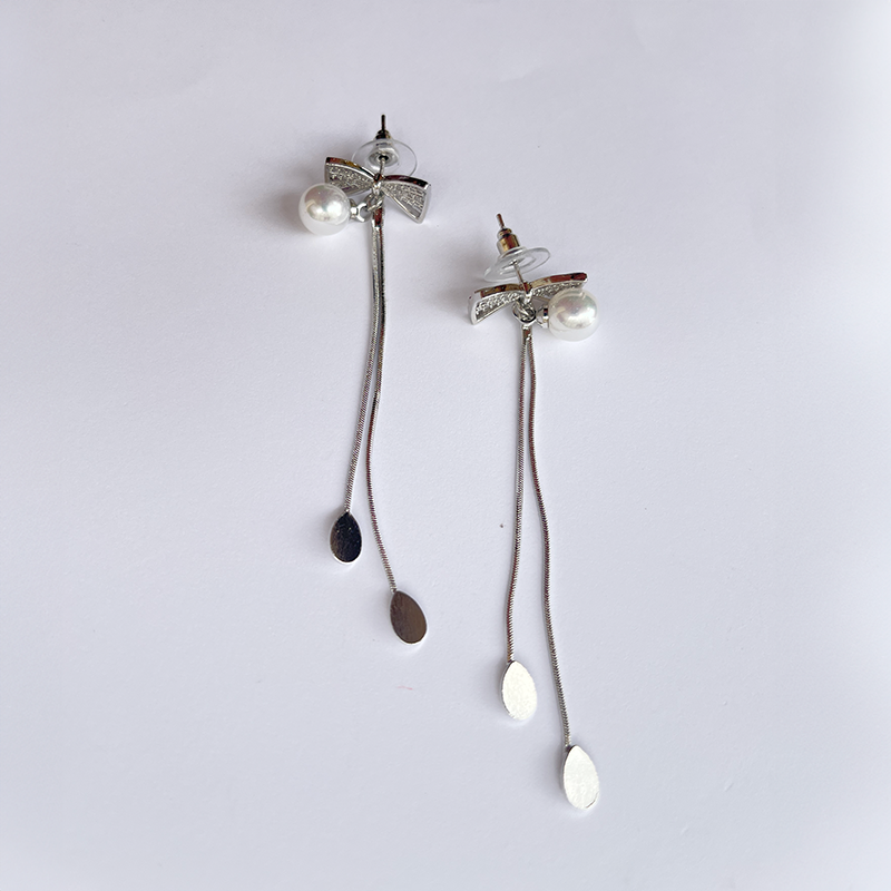 Elegant Bow Pearl dangle earrings